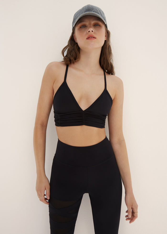 scrunchy bra - onyx | BodyLanguageSportswear | onyx  | 
why she speaks your language
Meet our most iconic bra and fan favorite. Scrunchy is designed in our