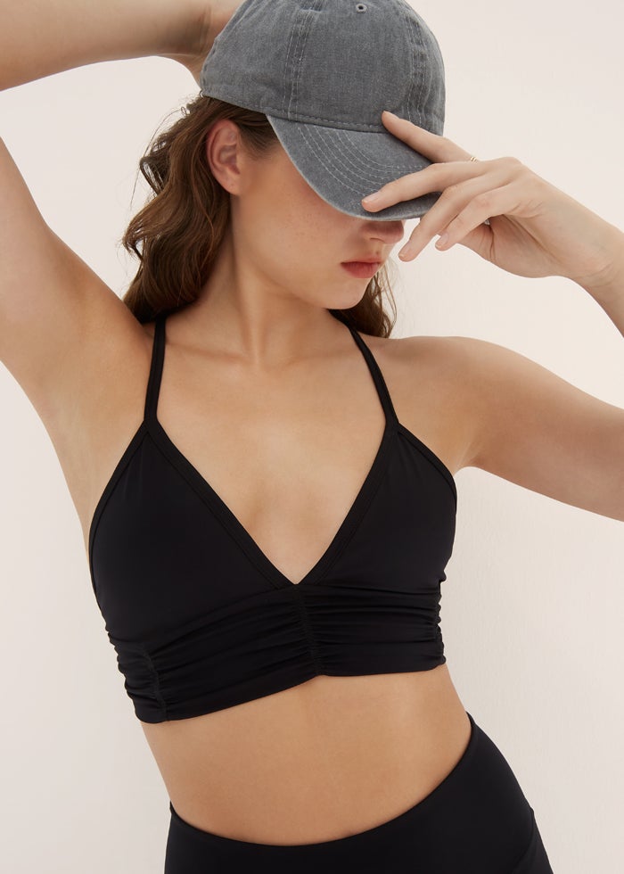 scrunchy bra - onyx | BodyLanguageSportswear | onyx  | 
why she speaks your language
Meet our most iconic bra and fan favorite. Scrunchy is designed in our